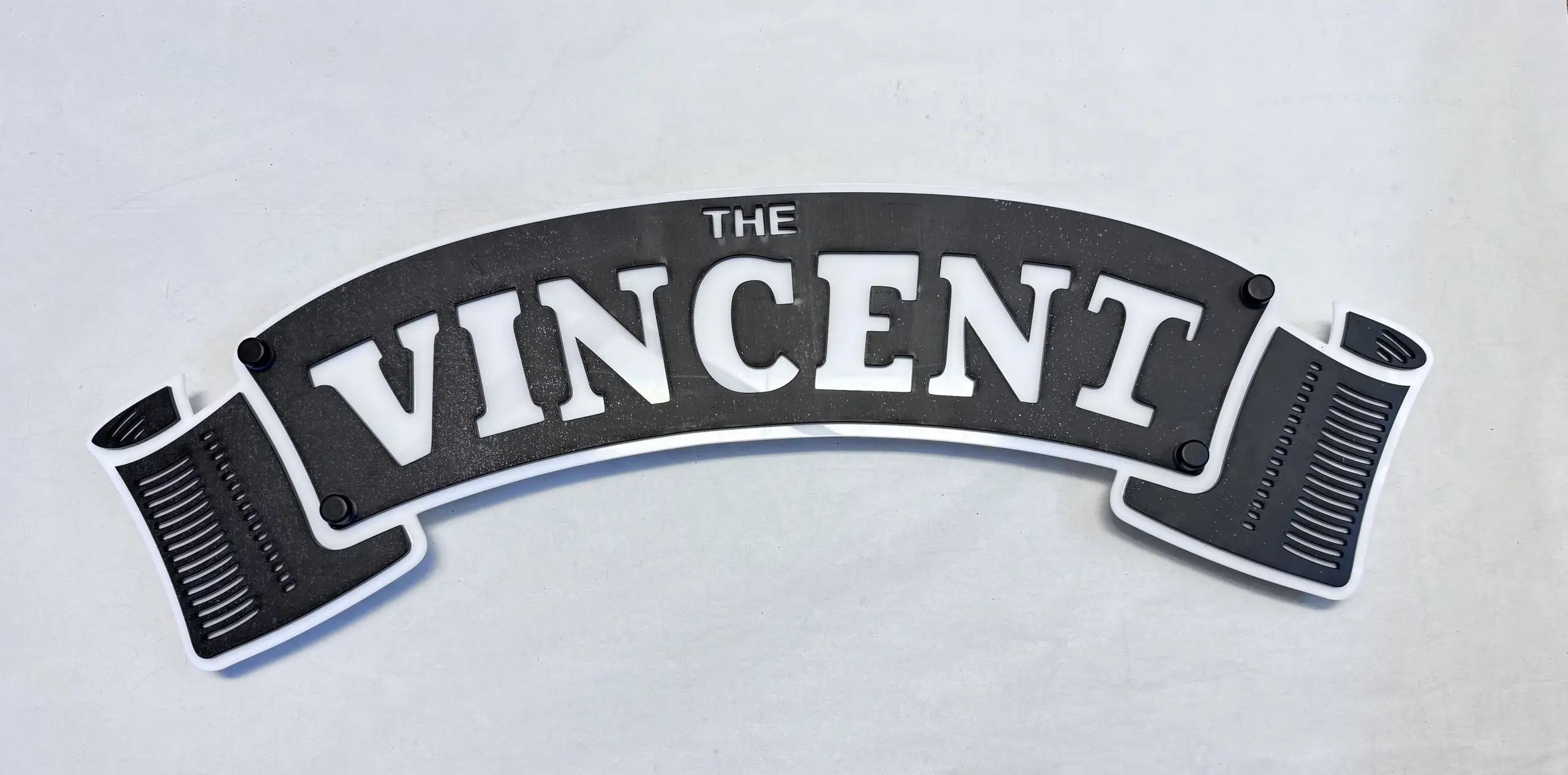 Front view of Vincent motorcycle badge, 56 × 19 cm two‑layer acrylic engraved wall art