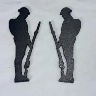 Small 18cm x 6cm gloss black acrylic 'Lest We Forget Sentry 01' silhouette with pair of soldiers, laser-cut by Boon Hill Designs on white background