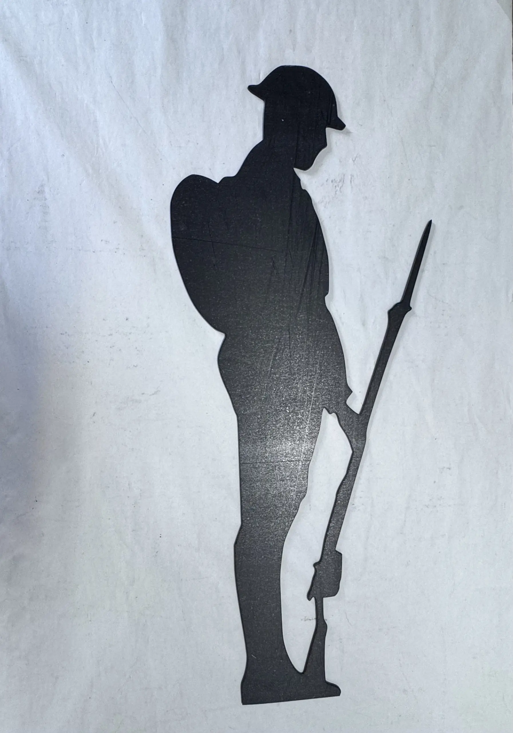 Large 59.5cm x 24.5cm black acrylic 'Lest We Forget' memorial sculpture silhouette, laser-cut by Boon Hill Designs