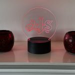 AJS motorcycle logo LED night light with 16‑colour remote‑controlled illumination on acrylic panel.