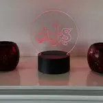 AJS motorcycle logo LED night light with 16‑colour remote‑controlled illumination on acrylic panel.