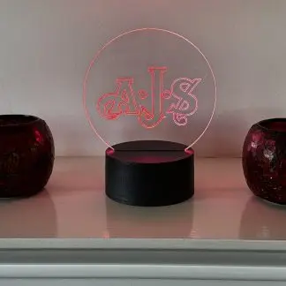 AJS motorcycle logo LED night light with 16‑colour remote‑controlled illumination on acrylic panel.