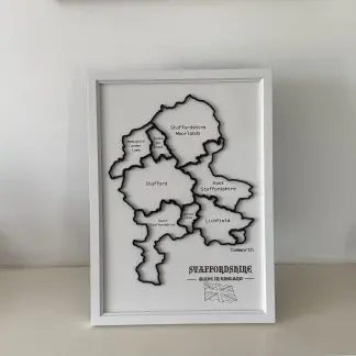 A4 MDF map of Staffordshire showing major towns and a “Staffordshire – Made in England” badge with a small Union Flag in the bottom‑right corner.