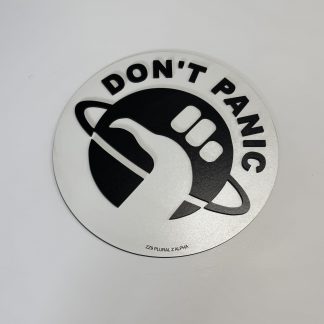 Circular black‑and‑white emblem featuring “DON’T PANIC” text and a stylised hand giving a thumbs‑up over a ringed planet, designed by Boon Hill Designs.
