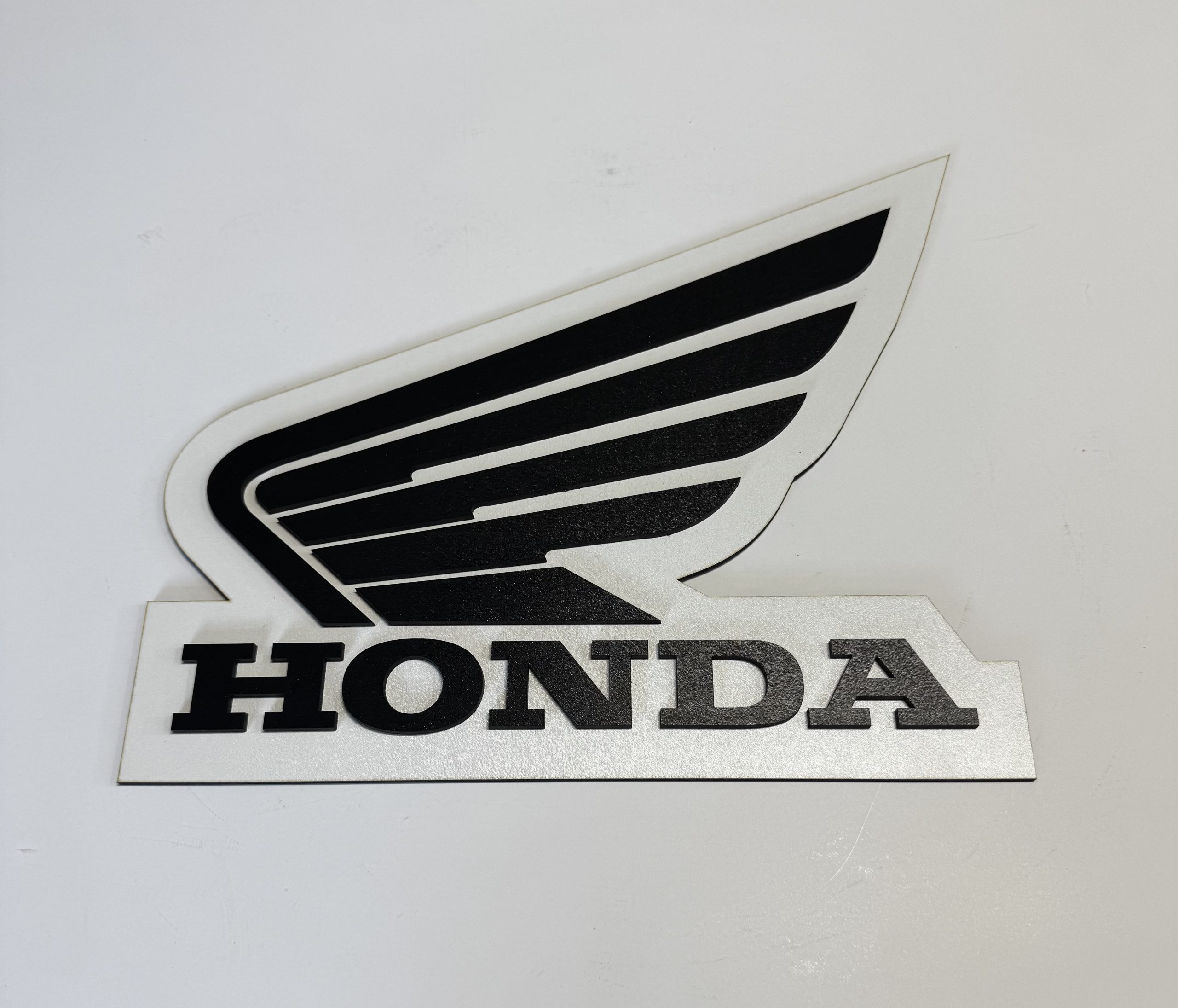 Honda Logo Sign – 29.5 × 25cm Two‑Layer MDF Engraved Motorcycle Wall Art - Boon Hill Designs - Custom Plaques, Signs & Gifts Front view of Honda logo sign, 30 × 25 cm two‑layer MDF engraved motorcycle artwork